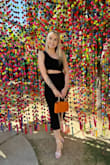 I love how this dress looked on me. The cut out in the midsection is flattering and the material has the perfect stretch. The slit was a little higher than expected but still appropriate for this occasion. (I included the group pic so you can see the slit - it starts right about where my wrist is) - Katie A.