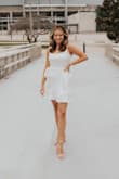 I wore this for my college graduation and I loved it. The straps were adjustable which made the fit even better. I would definitely recommend to anyone, super flattering! - Gabrielle H.