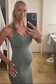 This is a great maternity dress, super stretchy. I think it would also be great if I were not pregnant . I'm at 18 weeks, 133lb. My usual size is xs but I ordered a small to accommodate my baby bump. Cute as is or with a Jean jacket. - Kristina P.