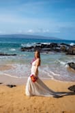 I eloped in Maui and was able to pack this nicely in my suitcase. It is all lace so no wrinkles! It fits very snug and has no stretch. I am a size 2 but it was a tad tight on me due to my athletic body type. The slit in the middle rode up my crotch so I had to adjust it. Other than that, I absolutely loved the fit and the look, and for the price, it is the perfect dress. I love the train too, it's so versatile for pictures! - Lindsey W.