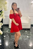 This dress was incredibly cute! I wore it to a wedding 6 months pregnant and loved the way it fit and looked. - Cristina V.