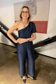 I loved this jumpsuit! Last summer, I attended a wedding and wore something old from my closet that felt very outdated. So I asked my 30-year-old daughter to find something for me that would suit a 68-year-old. She gave me 6 choices and I just loved the color and style of this one-shoulder jumpsuit. After reading all the comments on sizing, I picked a medium and it fit perfectly. Got a few compliments as well! - ANNE G.
