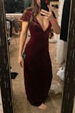 This dress is beautiful and I wanted it to work for a wedding but it was just too low and with smaller breasts fabric tape to keep it steady looked awful. Bummer. - Natalie A.