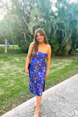 The color of this dress is amazing. My one year old daughter made me put it on her head because she was obsessed with the colors and how pretty it was lol. Then I wore it and geez it was cute.. such a fan of the high thigh slit. - Miella D.