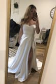 I ordered this wedding dress half expecting the quality to feel on the cheaper end but I was pleasantly surprised at how beautiful this dress is. I've tried on $2000+ dresses and this looked just as expensive. I originally ordered my normal size in a size 6 but I exchanged it for a size 4 since it was loose on top and in the waist. I ultimately ended up choosing a different dress for my big day but this was definitely my second choice! - Stefanie B.