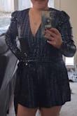 The material of the romper is so much thicker and heavier than expected. It did not feel cheap and the sequins are not scratchy at all. It is very flattering as the material is stretchy and not too revealing. Its a fun dress for Vegas or even a special event. - Elynne G.