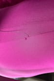 It has a noticeable hole where the tag is - Yessenia