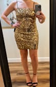 This was such a cute dress, the quality was really nice. The dress came about mid-thigh, but as you walk or move it will rise up and get a bit shorter, kind of a mini. It wasn't what I needed for an event I went to, but I would 100% but again if I was going to something a bit dressier. - Jessica C.