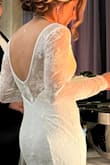 This dress is absolutely beautiful. Great material. I wore this during our reception and danced in it all night long. Def would recommend it. - Ghazaleh R.