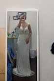 At first, I was afraid to purchase a wedding dress online without trying it on first. However, I'm surprised it fits perfectly on me and I love the style as well as the color with a little bling bling on the dress. In addition, I got a good discount on my first purchase and I'm impressed with this. If I have known about Lulus wedding dress sooner I would have purchased all of my dresses on here instead of David's Bridal. Moreover, Lulus gave my dress a plastic cover and an extra black fabric covered outside which I very much appreciated. Highly recommended Lulus wedding dress to all of the brides out there. - Hanh D.