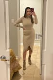 This dress has amazing quality, and is thick and soft to touch. It is super stylish and keeps you warm at the same time-perfect for those Chicago winters! I love the wrap detail at the bottom and is perfect to wear for a date night or to work. - Sabrina M.