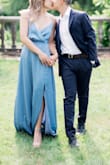I used the dress for my engagement shoot and it photographed perfectly. The shimmer from the satin looks great and the fit is very flattering. I did have to hem the dress 2 inches, but other than that the XS fit perfectly on me. - Mona S.