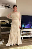This was is beautiful and fits great. The fabric beneath the lace is a nude color so it didn't seem as bridal to me which is what I was going for. - Amy B.