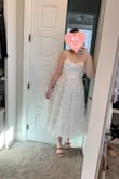 I plan on wearing this to my rehearsal dinner, and I love this dress!! The butterfly details are sooo pretty. Also love how the back laces up, making it easier to fit to my body. - Paige S.