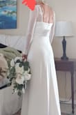 Getting married at the courthouse and knew this would be such a perfect dress. Fitted, slim, sleek and conservative all at the same time. Needs some alterations as the sleeves are a little too long... But what wedding dress doesn't need alterations right?  Obsessed with the train.  Mesh does NOT look cheap. Almost a 90s square neck vibe.  Can't say enough about this dress!!! Totally stoked for my wedding day!!!! Can't beat the price! Feels like expensive dress. - Kristin A.