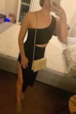 Little hard to get in and out but this dress is so cute and sexy! Stretchy and has nice thick material so no need to wear a bra. I love my dress! - Saki P.