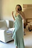 I love the color, the cloth and the model, It was too big in the bust area and under the bust area so I ordered a S size and fit me almost perfect - Sol C.
