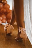I LOVED these shoes. I wore them to my bridal shower and then again to my rehearsal dinner and unfortunately the bow & ankle strap ripped from the heel at the rehearsal dinner and I was wearing it like a flip flop. Only got to wear them twice so a bit bummed. - Nicole G.