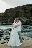 I ordered 2 bows and 2 headbands for our elopement in Hawaii! I couldn't decide until I put this headband on. It's so pretty without being too much. It ties at the bottom and stayed in place. The only downside was that the cove we were in was  SO windy and my hair did get tangled in the wires/pearls but it still looked just as beautiful! - Maddie G.
