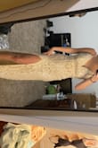 Beautiful dress. Once I get a bra for it, it will be perfect. Can't wait to wear it for my beach wedding!! Wish the review would've let me post the entire photo and not just half of it. - Grace B.