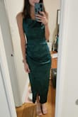 This dress fit like a glove! The material and quality are great! Just needs a steam and the right accessories and it's ready to wear to a wedding. - Lexi S.