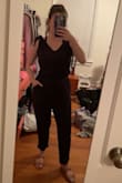 I am typically not a jumpsuit girl because they don't hide my stomach like I want them too, but this one is perfect!! I wore it on a 5 hour plan ride and it was insanely comfy, breathable, and stylish. The fabric is soft, cotton material, and you can adjust the straps by tying the knots different lengths. I am 5'2" and the length was perfect on me, so this may be a little short on the tall girlies. I feel this would be perfect for a casual night out or dress it up for a summer party. You could even wear it as a bathing suit cover-up. 10/10 in my book! - Kelsey M.