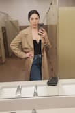 I love this top!! Its very flattering and perfect for a date night. I did not wear a bra with it and it was supportive enough. The material feels high quality. I would purchase this top again if more colors come available! - Kara B.