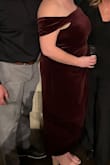 I'm a 44G (that option doesn't exist in the bra sizes) and that can make it tricky to find a dress that fits really well up there. I did feel like an old-timey movie star in this dress, but it's not cut for the big boobed gals. At my armpit, you could see my bra almost all night. Thankfully, as long as I didn't lift my arms above elbow height I was okay! But the color and material are a 10/10. - Emily M.