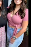 This wrap shirt fits great, especially on larger-chested people! I got so many compliments on the pink color and now that the black one is back in stock, I am ordering immediately! - Brittany B.