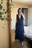 All of my roommates tried this dress on when I got it and it looked great on all of us. Low cut but not too revealing for a C cup chest. I ordered a size down because of reviews (I'm usually a small) and it's perfect. Very flattering! - Hannah S.