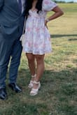 This dress is absolutely stunning. I got many compliments from the summer wedding I wore it to. You can easily dress it up with cute heels, or dress it down with some white tennis shoes! It is also so comfortable. My bust size is small enough so I didn't worry about flashing anyone. I paired it with the white sandals I ordered from Lulus as well. If you are debating on buying this dress, don't even think...JUST BUY IT! - Kathy D.