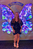 Definitely short in the front and more of a standing dress but it's super flattering and comfortable. You can easily wear any bra with it. The quality was good too especially for a sequin dress. - Natalie H.