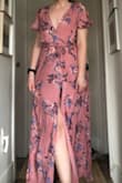 Was suprised to find the zipper at the back of this dress, assumed it was a full wrap dress. Honestly for the best, wont have to worry about it slipping at all. It's a lovely dress and the fabric has a very nice texture and weight. Fits well overall, but the bust felt loose for me. - Erin G.