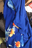 I loveeeee the colors on this dress! The color combination is lovely and the colors are very vibrant! As per other reviews, I sized down 1 size (I'm normally a M but bought a S) and it fit perfectly! I love how flowy and light it is. The V does go a bit low but I don't have much of a chest so it doesn't make me feel super self-conscious of anything. The hem is a little long on me but if I wore heels, it probably wouldn't be too much of an issue. But I will be matching this dress with low wedges, so maybe I'll get it hemmed a few inches. I bought this in anticipation of a destination wedding in Guatemala. I can't wait to wear it! - Nancy C.