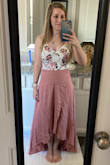 I love this skirt! It does not have any stretch to it, so check the sizing chart! Perfect and lovely! - Jessica B.