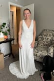 This is the one! It had everything I wanted - love the beading, the train, the V neck and back, the comfortable sleeves. I am going to have to get the sleeves shortened and the bottom hemmed, but I am 5'3" with small boobs, so I expected that lol. It is great quality and looks way more expensive than it is. I can't wait to wear it on my special day! - Carlie W.