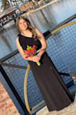 Dress fit well. Had to have it hemmed because it was a little long for me. The material was nice too. - Heidi B.