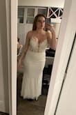 This dress is very pretty but just didn't feel like it flattered my body type. Felt a little short in the front on me. - Jasmine H.