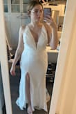 I sized up on this based on the size chart and went with an xl and it was way too big in the top. Overall gorgeous dress. The train tends to bunch up and not flow very well. - Jasmine H.