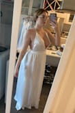 Gorgeous dress. Super bright cool white, warmer whites tend to flatter me a little better. Considering saving for a reception dress. Would be great a beach wedding - Jasmine H.