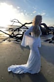 The dress was delivered fast. Fits perfectly and is a nice quality material. It was a wonderful dress for my beach elopement. - Sarah M.