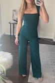 Pleasantly surprised with this jumpsuit! I needed a fun outfit for a work dinner and this fits like a glove - flattering but not too risky. - Neleigh W.