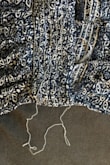 The dress fit well but the white elastic under the bust started unraveling after one use. And you can't send it back once the tags are removed. Dress is see-through and cheaply made. - Stephanie W.