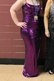 I loved the color and shine of this dress. You can wear a strapless bra with it, that's great. It was a touch casual for the formal event I purchased it for. Be advised, the slit is adventurously high. - Jessica B.