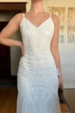 BEAUTIFUL dress. I have had trouble finding a dress that was flattering for my body type (flat chested, broad shoulders, smaller waist) but this dress was perfect. Although I ended up going with a different dress, it was a very difficult decision. - Franny B.