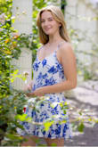 At fist I was skeptical because I am use to wearing tighter dresses, but the shape and design of the dress is classy. I wore it for my senior photos, but I will continue to wear it out for dinners and other events! A little see through, but if you wear skin tone underwear, it works. - Cait P.