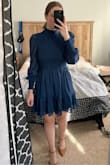 I got this dress for my boyfriend's white coat ceremony and it was perfect! The fit was true to size - I'm 5'5" 130 lbs and got a size Small. I loved the subtle sparkle in the sheer, mocked neck line, and sleeve detail. Excellent quality! - Kristen S.