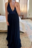 This dress is really gorgeous and wanted this to work out! The color is beautiful but it's entirely too long (even for me who is 5'7) and the cups are massive. If you are small-chested, this won't work out for you. I'm a large C, small D and I could fit almost my whole fist into the top of it. Super disappointed - Nicole C.