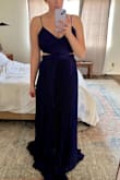 This dress is very interesting, the pattern and flow is really cool. However, the color isn't the same as pictured. The website says it's navy blue, but this dress is way more purple/violet. Additionally, if you are big or super small-chested, this won't fit you well and there is a zipper portion on the back just for the chest area. - Nicole C.
