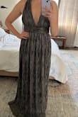 The material and metallic is really edgy and nice but the fit isn't amazing. While it fits in the body, the straps aren't adjustable and with an average chest size, it could use a little bit of a lift. Also, the fit isn't the most flattering, doesn't do much to accentuate your body shape - Nicole C.